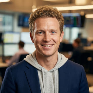 Ryan Brooks, listed as Lead Trading Analyst at Pledgement, in a profile image